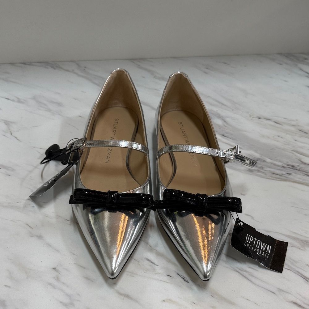 Stuart Weitzman Metallic Silver Flats with Black Bow